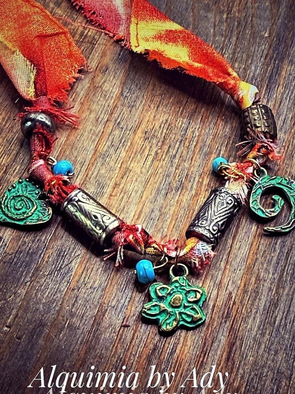 Turquoise wrap  bracelet in burnt orange & Green patina charms